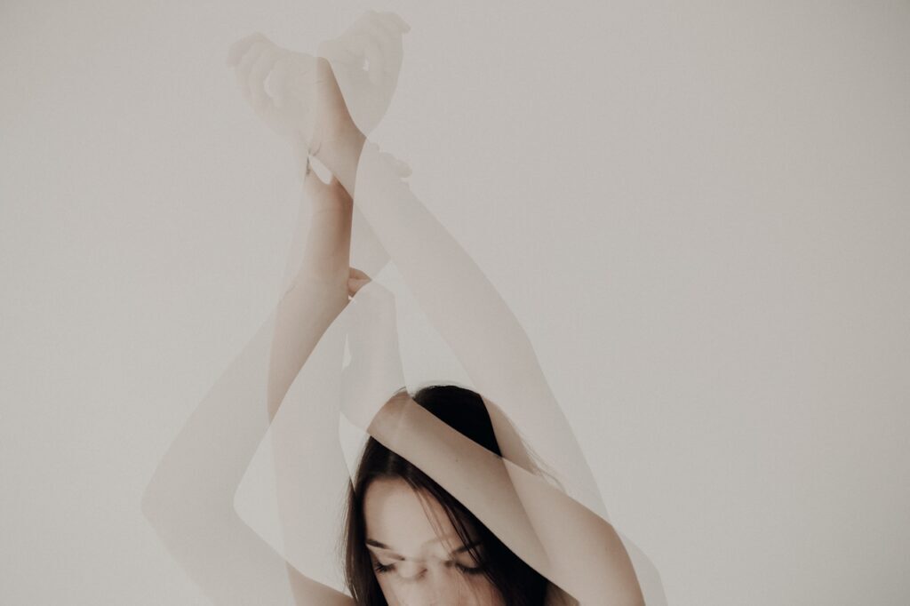 double exposure of woman in neutral aesthetic